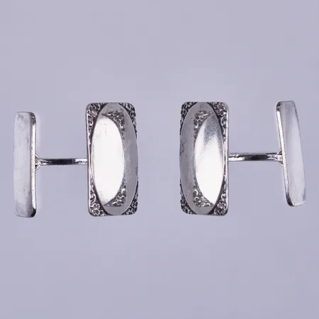 Ett manschettknappar, längd: ca 1,8cm, bredd: ca 13mm, 830/1000 silver  Vikt: 7,4 g