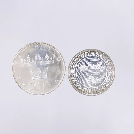 2 jubileumsmynt, silver 925/1000 Vikt: 42,9 g