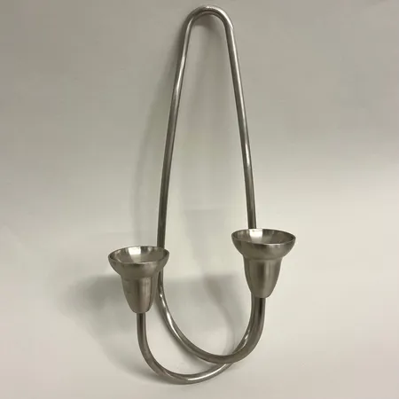 Väggljusstake, Georg Jensen, Rostfritt stål, "Swing", formgivare Jens Jensen, höjd 36cm