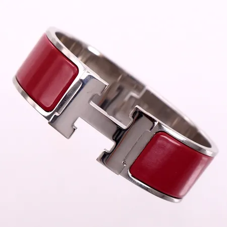 Armband Hermés, Clic Clac H, stl: GM, inre omkrets ca: 16,5cm, bredd: ca 20mm, vitmetall med röd emalj, Stämplad: P, Made in France, dustbag och ask,  Vikt: 0 g