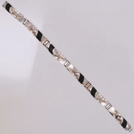 Armband "Bantu", Zoltan Popovits, Lapponia, längd 18cm, bredd ca 7,5mm, år 1986, ebenholts och silver 925/1000 Vikt: 24,9 g