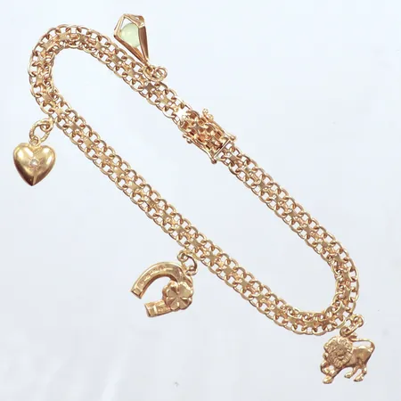 Armband X-länk, längd 18,5cm, bredd 4,80mm, 4 berlocker,  Michelsson Eftr Guldsmed år 1959, 18k   Vikt: 10,8 g