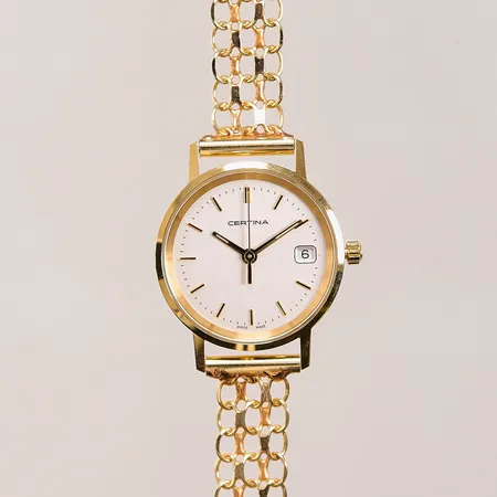 Damur Certina 18K, 24mm, quartz, band i 18K, totallängd ca 20cm, gravyr, bruttovikt 23,7g.