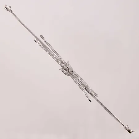 Armband, diamanter totalt ca 0,83ctv, (54x ca 0,01ct + 42x ca 0,005ct + 4x ca 0,02ct), 17cm, vitguld 18K 16,1g.