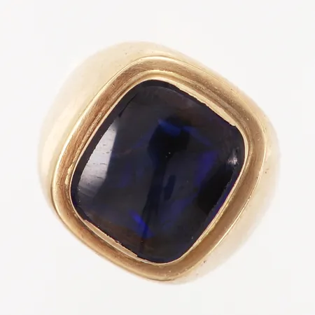 Klackring med blå sten, stl 20, bredd: 3,5-18mm, mindre slitage på sten, små bucklor på skena, 14K  Vikt: 8,2 g