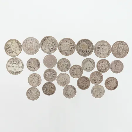 Mynt, 8 st 50-öringar, 17 st 25-öringar, silver 600/1000 Vikt: 79,3 g
