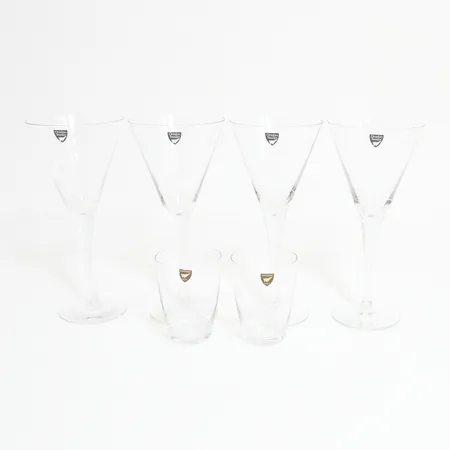 Fyra coctailglas Ø92mm, Höjd: 20cm, två selterglas Ø60mm, höjd:80mm, etikettmärkta Orrefors Skickas med postpaket.
