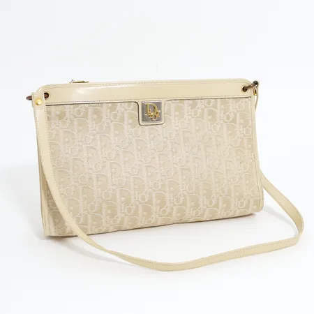 Aftonväska Christian Dior,  Made in France, jaquard tyg med monogrammönster, ca 5x20x29cm, axelrem i läder, 1900-talets andra hälft, slitage på beslag