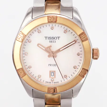 Klocka Tissot PR100, quartz, 36mm, stål med plätering i roséguld, pärlemorurtavla, diamantindex, länkens innermått 16,5cm, två extra länkbitar, certifikat på diamanterna och  garantikort från 2021 medföljer,  referensnummer: T101.910.22.116-00, serienummer: E4UD49VB8, batteribyte krävs, box
