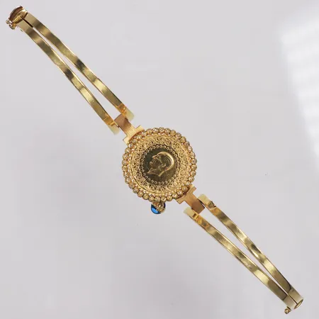 Armband, halvstelt, mynt Attaturk år 2024 21,6K, ca 15cm, berlock ögat, defekt buckla, 14K  Vikt: 14,4 g