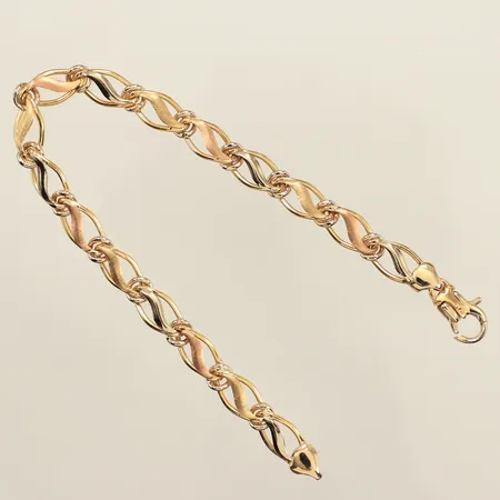 Armband, trefärgad, längd 19cm, bredd 6,5mm, spricka i lås, 18K Vikt: 6,9 g