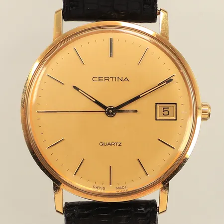 Armbandsur Certina, 18K, 33mm, quartz, datum, läderband, 18K bruttovikt: 27,9g