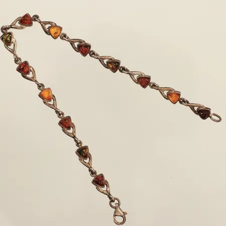 Armband med bärnsten, ca 19cm, bredd ca 5,7mm, 925/1000 silver Vikt: 5,8 g