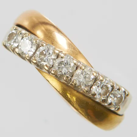 Ring, briljantslipade diamanter 7 x ca 0,10ct, ca Wesselton(H)/SI, stl 17, bredd 6-7,5mm, vitguld/rödguld/roséguld, 18K  Vikt: 8 g