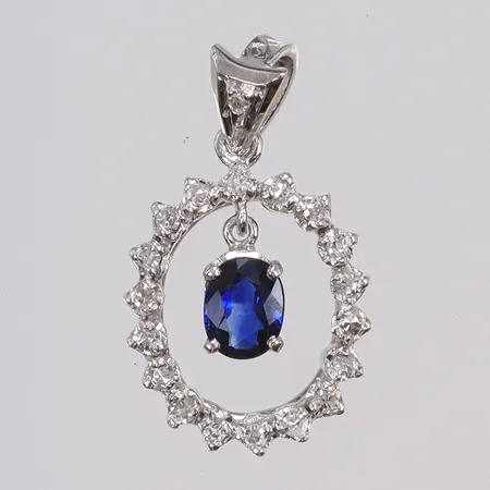 Hänge i vitguld med hängande blå sten samt diamanter 1xca0,01 samt 18xca0,02ct, 13x21mm inklusive hängöglan, 18K Vikt: 2,1 g
