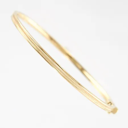 Armband, stelt, öppningsbart, innermått ca 60x55mm, bredd ca 3mm, GHA, ihåligt, 18K Vikt: 4,4 g