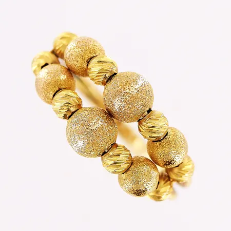 Ring, snurrande kulor, stl 17¼, bredd 2-9,5mm, 21K. Vikt: 0 g