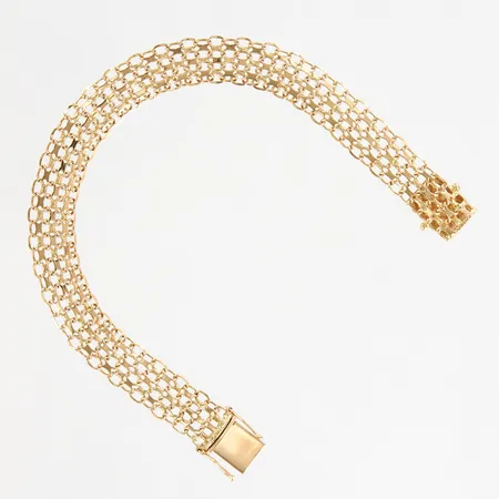 Armband x-länk, ca 19cm, bredd ca 9mm, något rundade kanter, 18K Vikt: 11,7 g