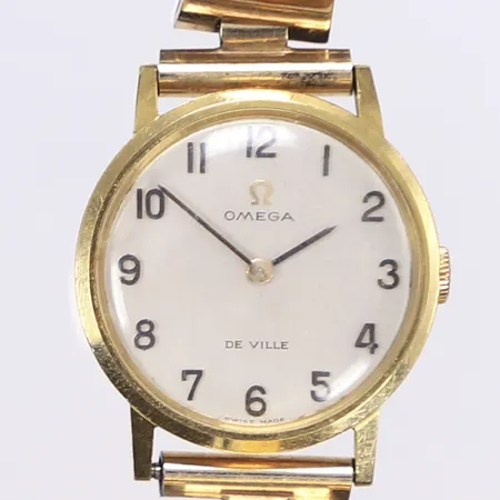 Damur Omega, Ø24mm, manuell, cal. 620, 18K i boett, armband dubblé, smärre slitage, Bruttovikt: 21,9g