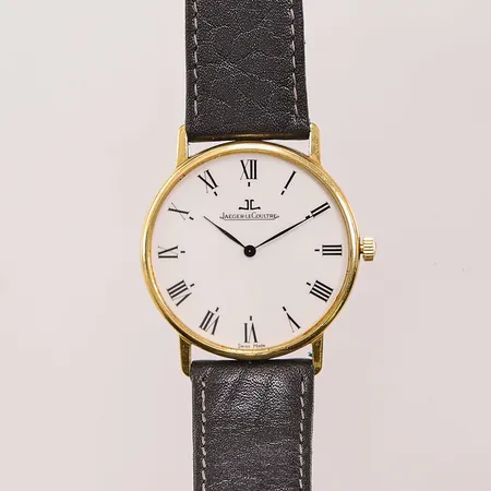 Herrur Jaeger LeCoultre 18K, Ultra Thin, 32mm, quartz, refnr:140 111 1 N, serienr: 1636030, graverad boett, läderband ej original, går ej, batteribyte krävs, inga tillbehör. Vikt: 0 g