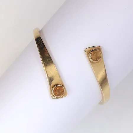 Armring med gula stenar troligen citriner, öppen skena, ca Ø55cm, bredd 2-9mm, tillv. Sven-Erik Högberg, Göteborg 1964, 18K Vikt: 26,8 g