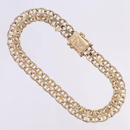 Armband, x-länk med stav, 19cm, bredd 8mm, 18K  Vikt: 14,6 g