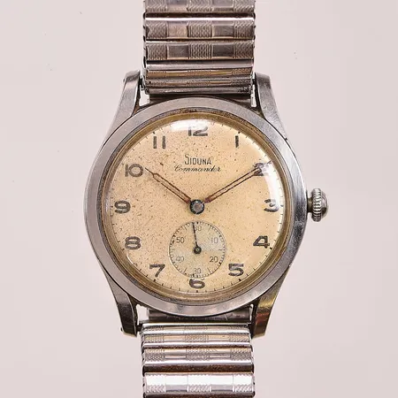 Herrur Siduna Commander, 36mm, stål, manuell, boettnr:1/265624, skadad urtavla samt visare, flexband.