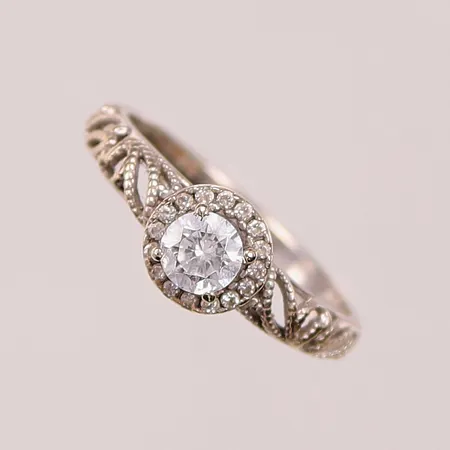 Ring, Ø16¾, bredd:7mm, vita stenar, 14K 1,8g.