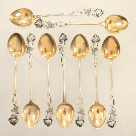 Nio kaffeskedar med rosdekor, längd 12cm, förgylld detalj, Finland, 813/1000 silver  Vikt: 86,8 g