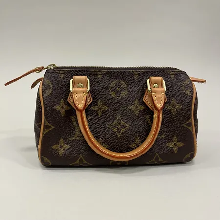 Väska Louis Vuitton Nano Speedy, TR0161, monogramcanvas, bruna skinndetaljer, guldfärgad beslag, märkt Louis Vuitton Paris made in France, längd 16cm, höjd 10cm, bredd 7,5cm, smärre bruksslitage, inga tillbehör  