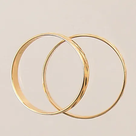 Ringar, två stycken, graverade, 18K  Vikt: 3,8 g