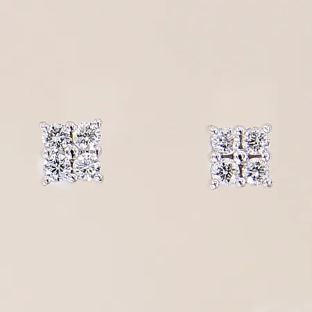 Ett par örhängen med diamanter 8 x ca 0,02ct, Ø4mm, vitguld, ena saknar stopp, 18K  Vikt: 1,2 g