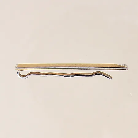 Slipsklämma med diamant ca 0,005ct, 50x7mm, metall, 18K  Vikt: 6,8 g