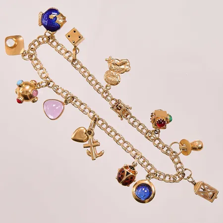 Armband Bismarck, 19,5cm, bredd:4mm, 12 berlocker, 18K 17,1g.