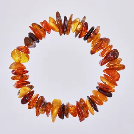 Armband med bärnsten, flexband, ca Ø6cm, bredd ca 8-15mm