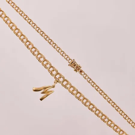Collier Bismarck, 43cm, bredd:4-6mm, slitet lås, berlock "M", 18K 16,5g.