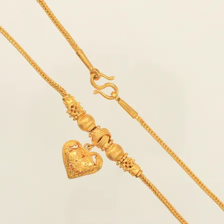 Collier, längd 42cm, bredd ca 2-25mm, något ojämn länk, 2 Baht, Thaiguld, 23K Vikt: 30,4 g