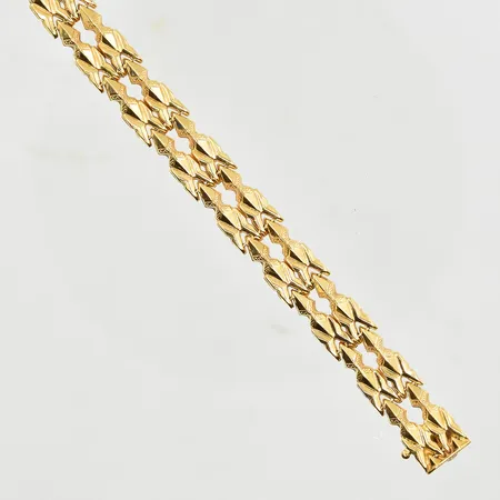 Armband, halvstel modell, längd 20 cm, bredd 11 mm, 18K. Vikt: 16,2 g