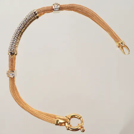 Armband med vita stenar, längd 20cm, bredd 6-12mm, 18K, bruttovikt 23,5g Vikt: 23,5 g