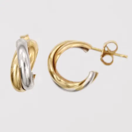 Ett par örhängen, vit-och gulguld, Ø15mm, bredd 6mm, bruksslitage, 18K guld.  Vikt: 4,7 g