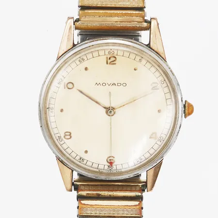 Herrur Movado, manuell, ca Ø34mm, stål 1950/60-tal, slitage, missfärgad, repor, trög senare krona, senare flexband.