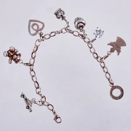 Armband med 7 berlocker med emalj och stenar, Thomas Sabo Charm Club, längd ca 20,5cm, bredd ca 5mm, sliten förgyllning, silver 925/1000 Vikt: 28,8 g