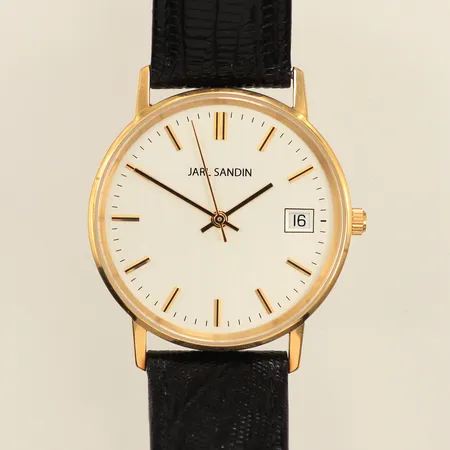 Armbandsur, Jarl Sandin, Ø33mm, quartz, datum, boett i 18K, boettnummer: JS56.92.18-1514-EOL, läderband, går ej, gravyr, repig, inga tillbehör, bruttovikt: 33,3g. 