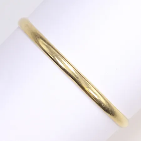 Armring, slät, Ø7cm, bredd 5mm, något ojämn i formen, 14K  Vikt: 6,4 g