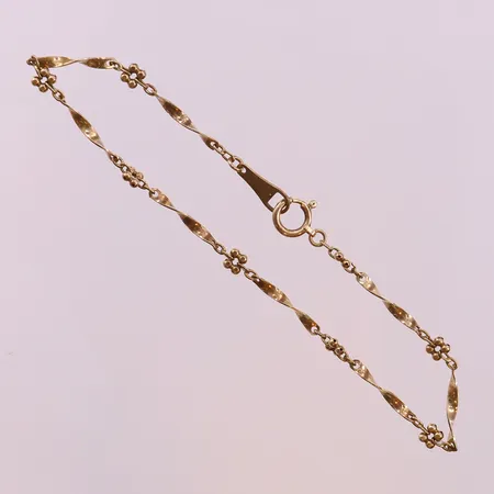 Armband, längd 18cm, bredd 3mm, 18K.  Vikt: 2 g