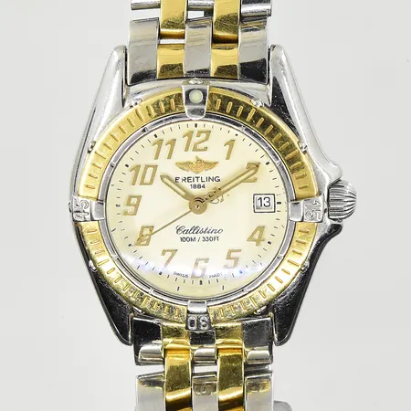 Damur Breitling Callistino, boett Ø26 mm, quartz, datum, safirglas, serienr D52045.1, refnr 6267, pilotlänk, guld/stål, fungerade vid testtillfället, inga tillbehör.