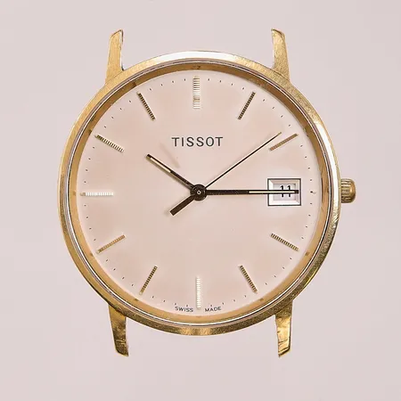 Herrur Tissot 18K, 33,5mm, quartz, gravyr, gårej, bruttovikt 21g.
