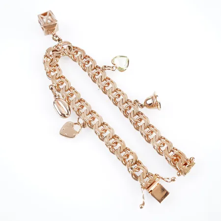 Armband bismarck m 5 berlocker, 19cm, bredd 8mm, 18k, mkt fint skick Vikt: 29,7 g