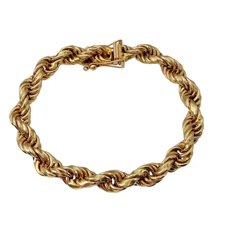 Armband Cordell, 18K guld, kraftig modell, längd knäppt 19,5 cm, diameter 8 mm, fint skick Vikt: 51,8 g