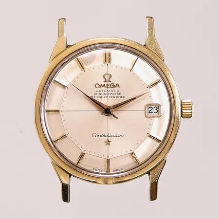 Herrur Omega Constellation Pie-Pan, 34mm, guld på stål, automat, refnr:168.005, Cal.564, verknr:26732624, datum, repig, skadad urtavla, krona går att skruva av kronstammen, funktionen funkar.